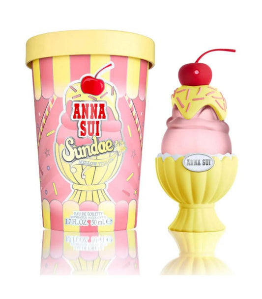 Anna Sui Sundae-themed perfume bottle with pink and yellow design on a white background